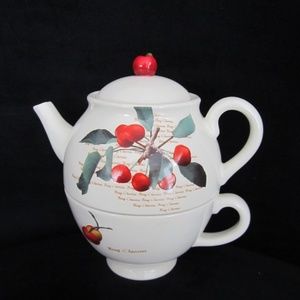 Harry and David teapot with cups all in one piece.